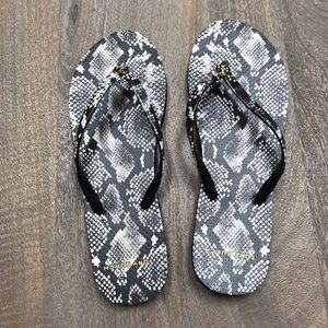 Tory Burch flip flop.